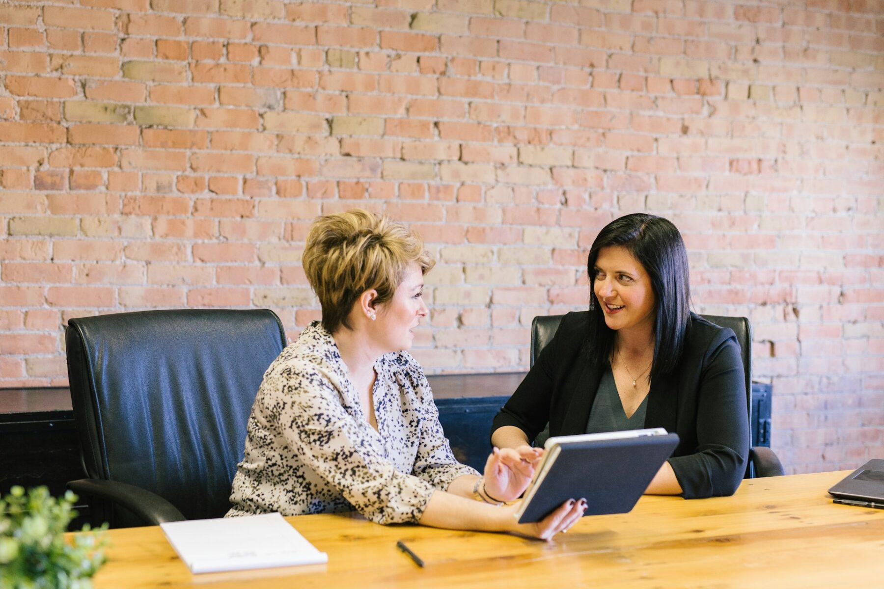 Lawyer reviewing a severance agreement with a client.